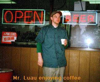 Rick in front of store with coffee in hand